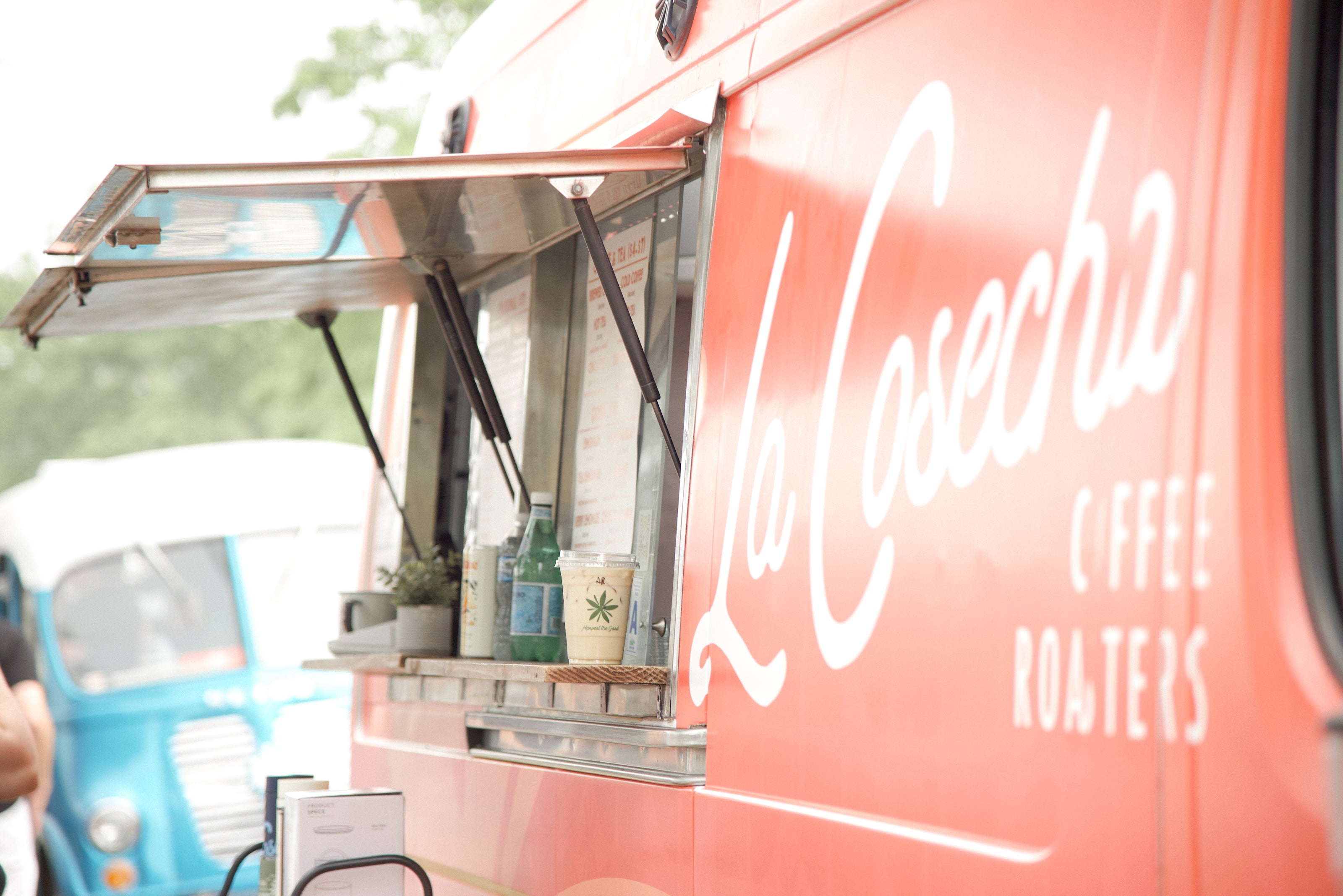 Brewster, our coffee truck, serving at a farmer's market.