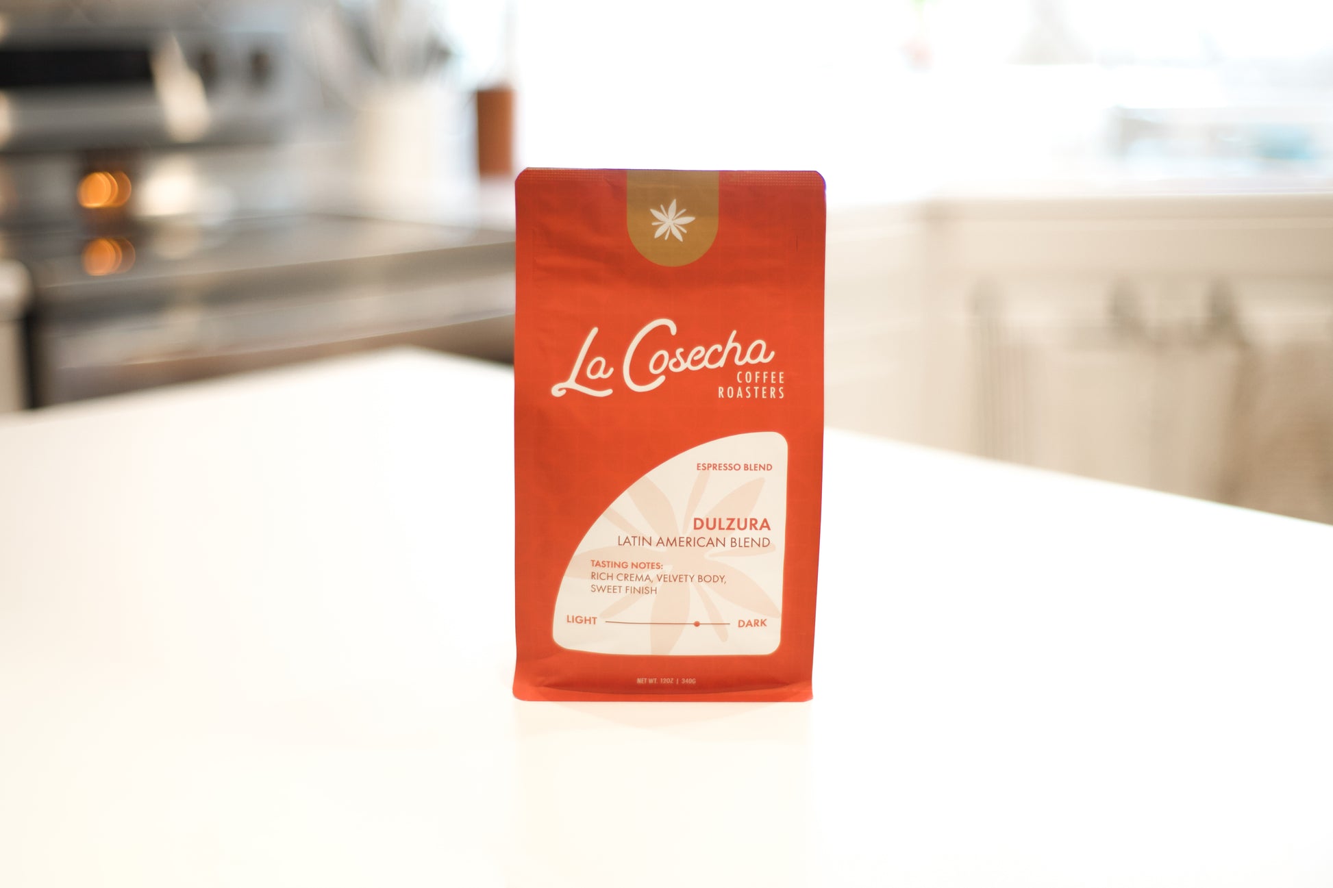 La Cosecha coffee package on a kitchen counter