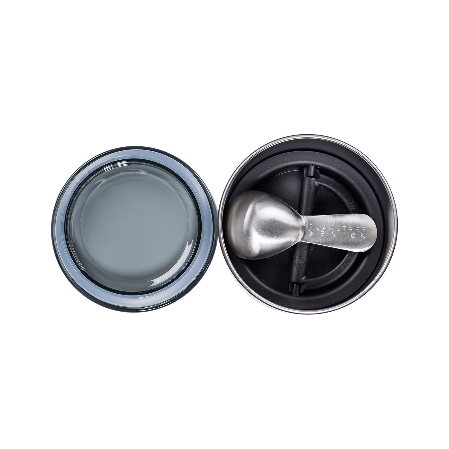 Two pet bowls, one gray and one black, with a metal scoop on a white background.
