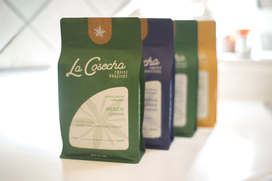 La Cosecha Coffee Roasters packaging on a white surface