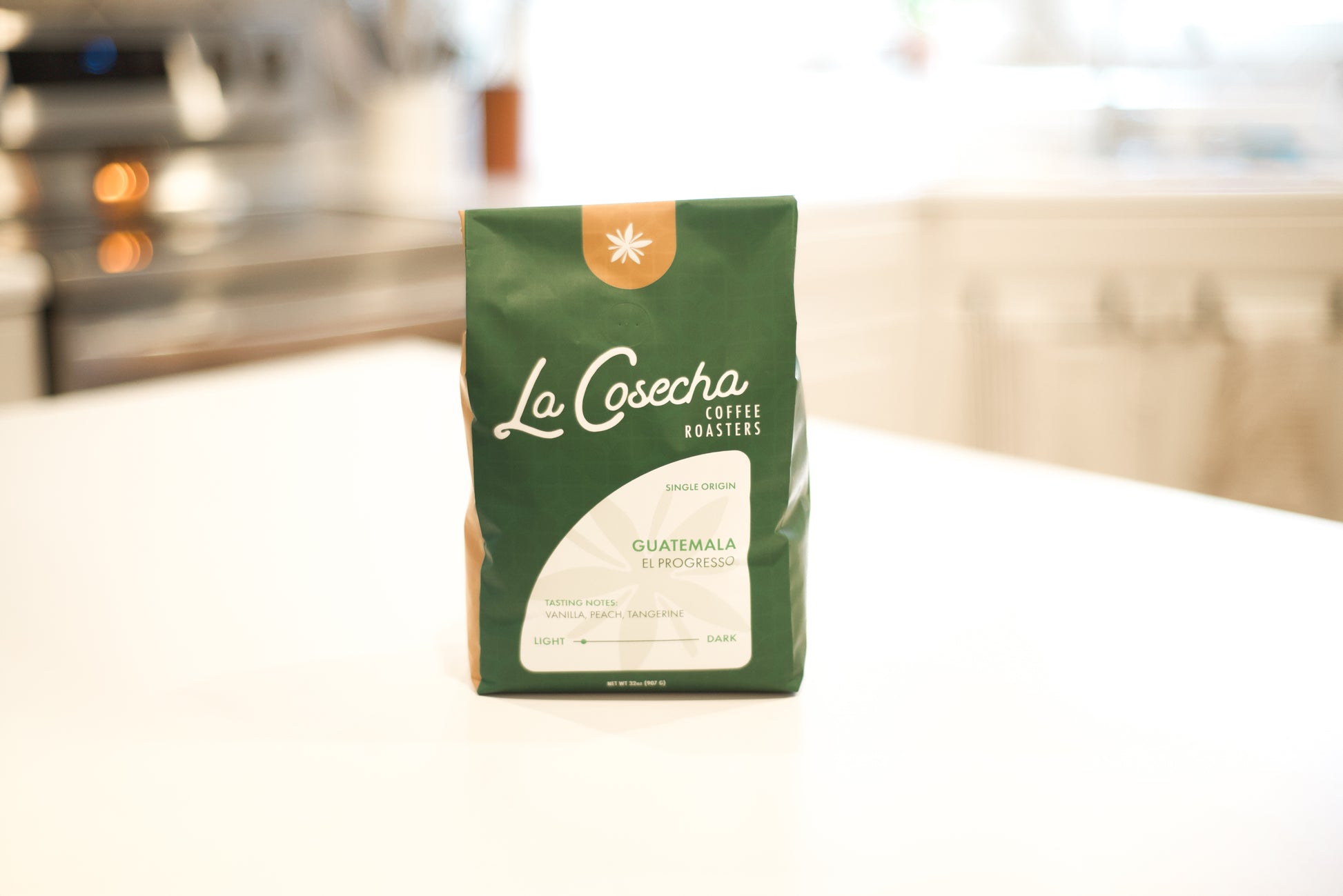 La Cosecha Coffee Roasters bag on a kitchen counter