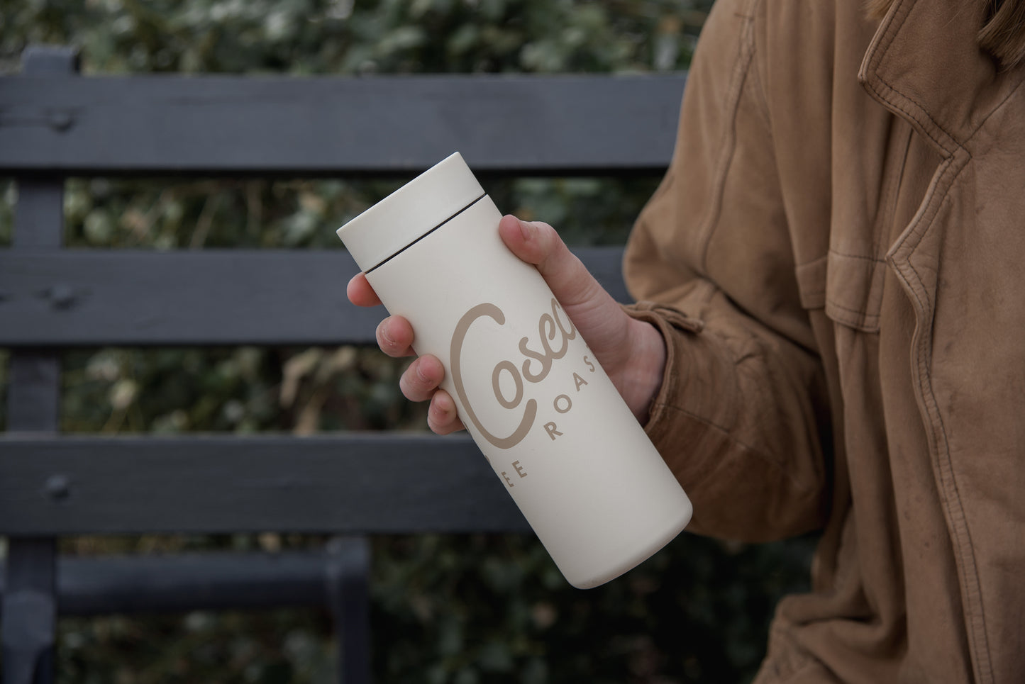 Person holding a Miir 360 Traveler with La Cosecha branding