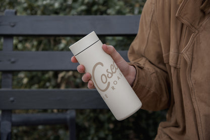 Person holding a Miir 360 Traveler with La Cosecha branding